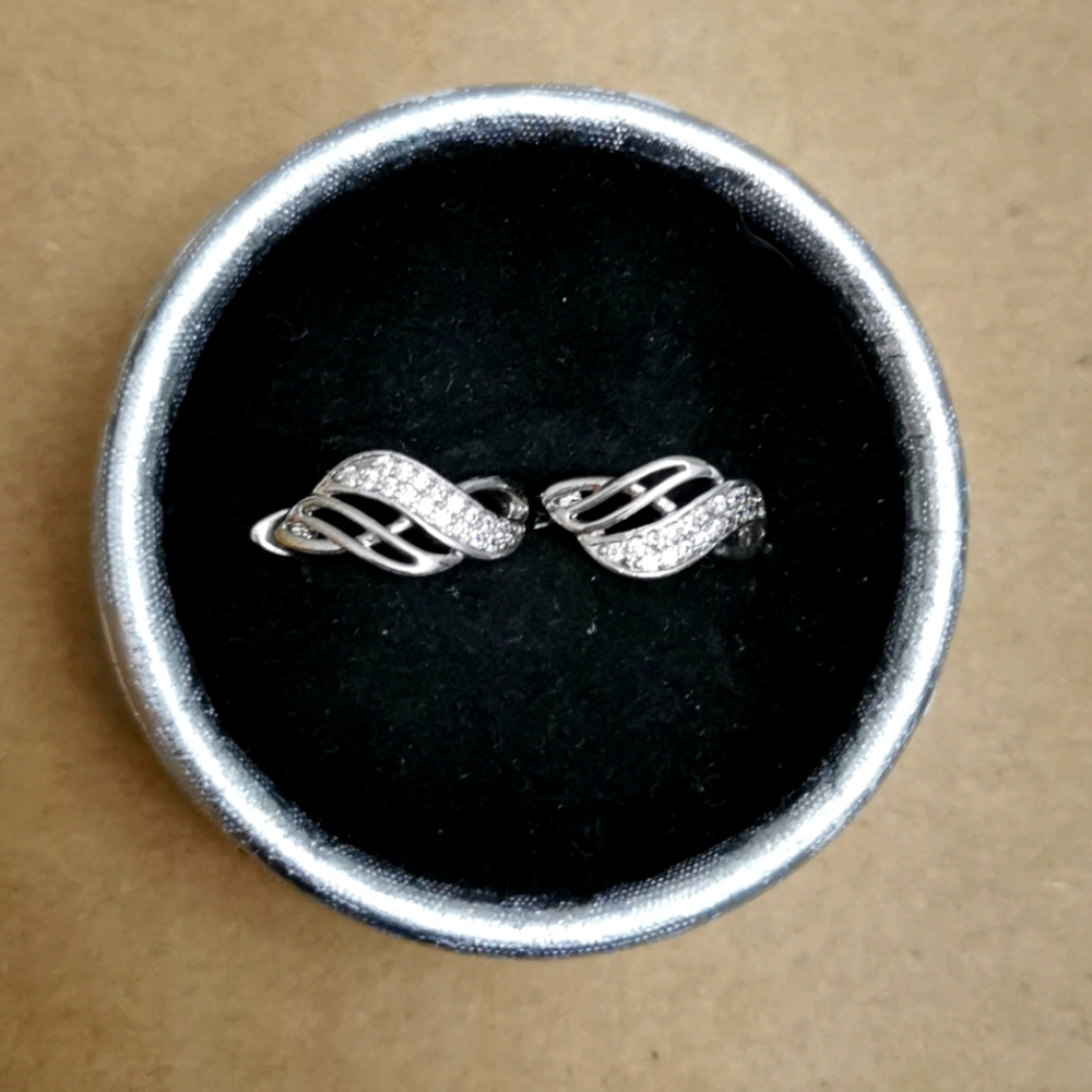 New. Silver toned, rhinestone earrings